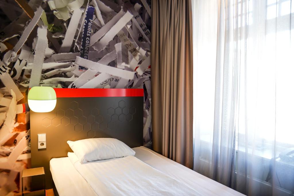 Postel nebo postele na pokoji v ubytování Comfort Hotel Norrköping