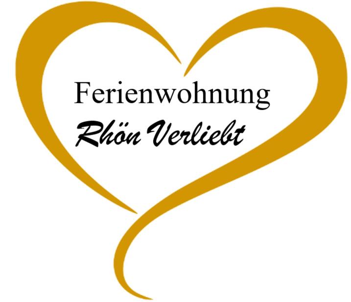 two hearts with the words feigningiumiumium fluvent at Ferienwohnung Rhön Verliebt in Abtsroda