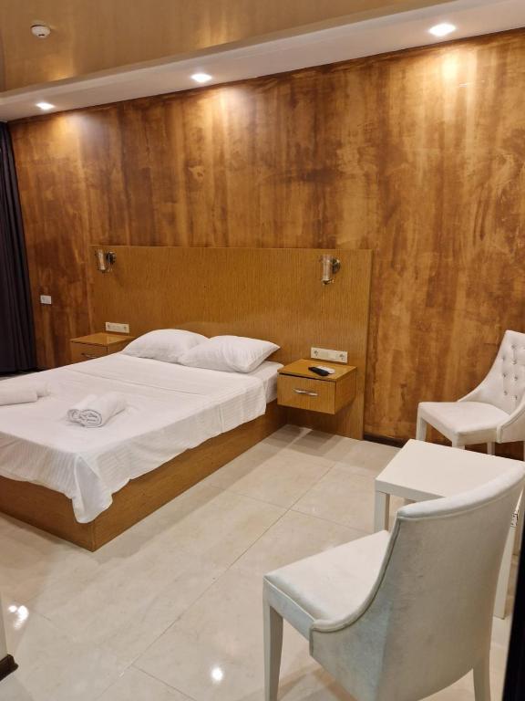 Postel nebo postele na pokoji v ubytování New House Kobuleti 2