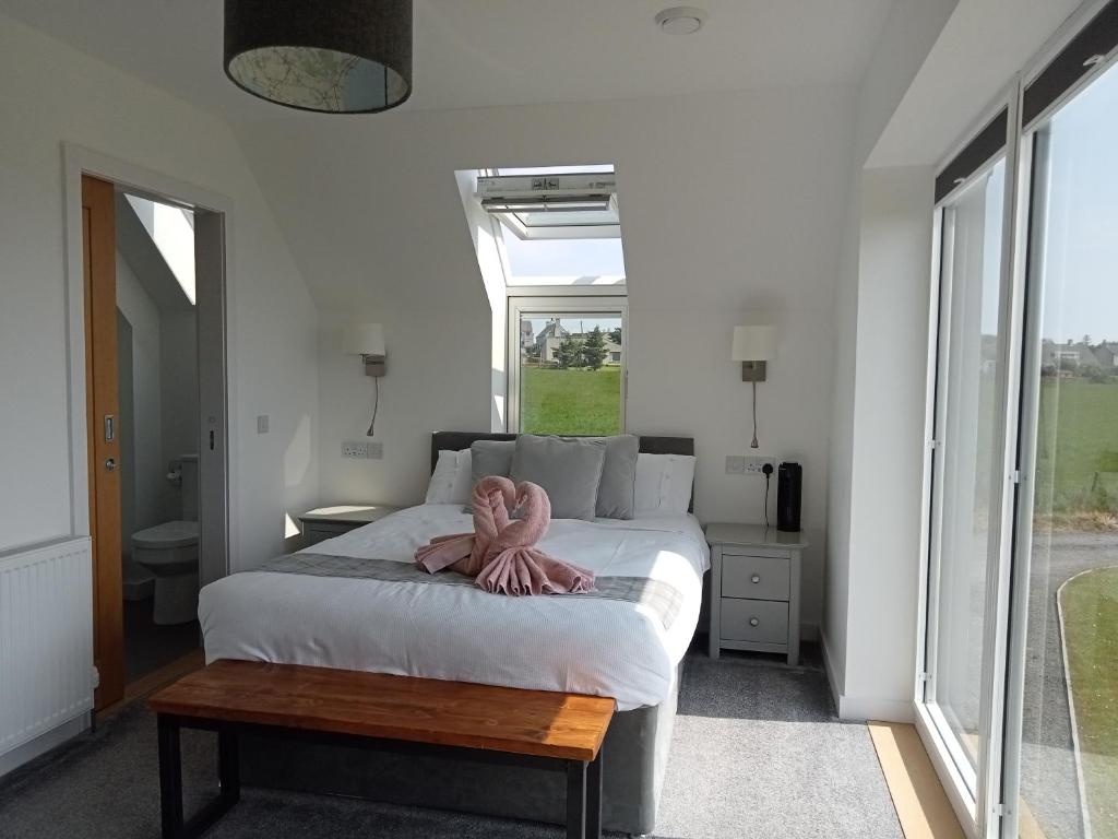 Postel nebo postele na pokoji v ubytování Flotnar Hús - Modern B&B