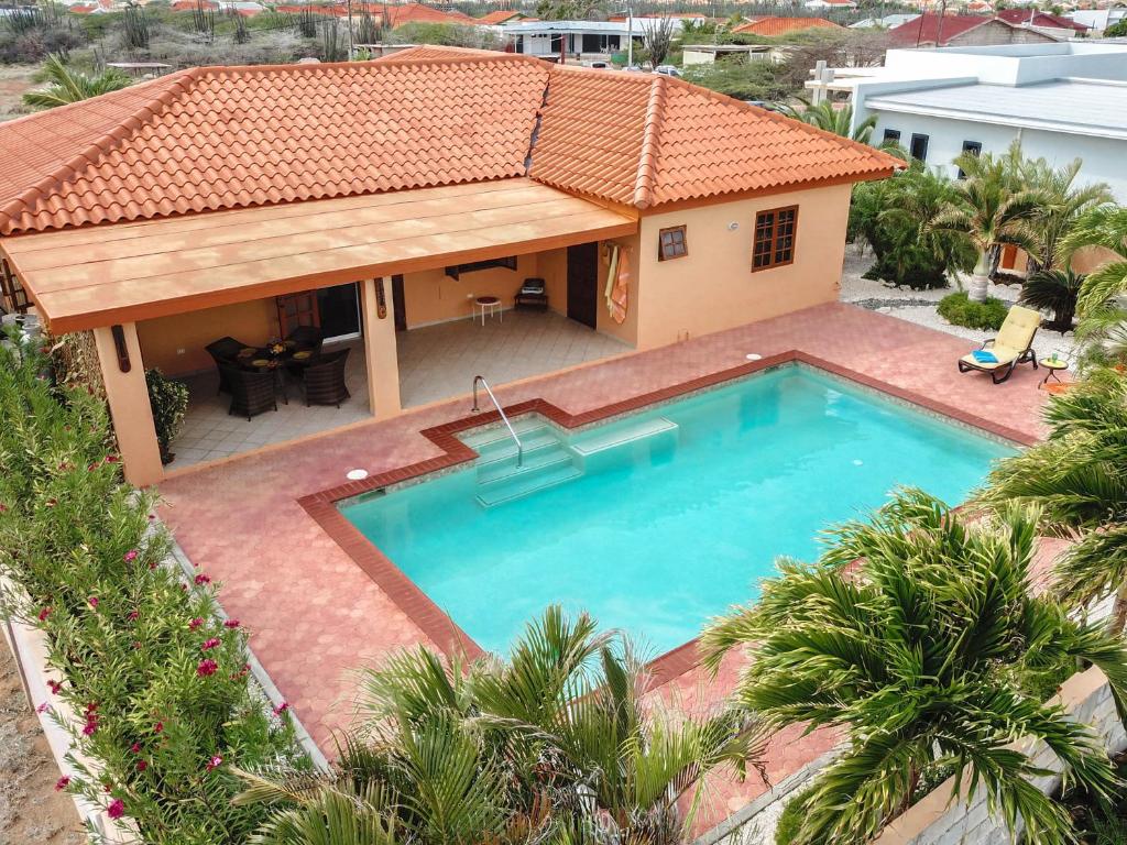 an aerial view of a house with a swimming pool at Sunrise Villa in Noord