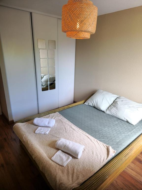 Postel nebo postele na pokoji v ubytování Logis Gaïa