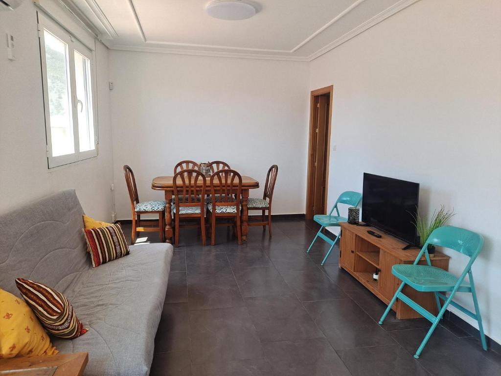 Posezení v ubytování Ático con terraza