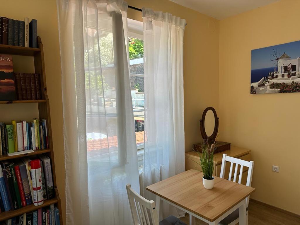 a room with a table and a window at Burgfreiheit in Heidelberg