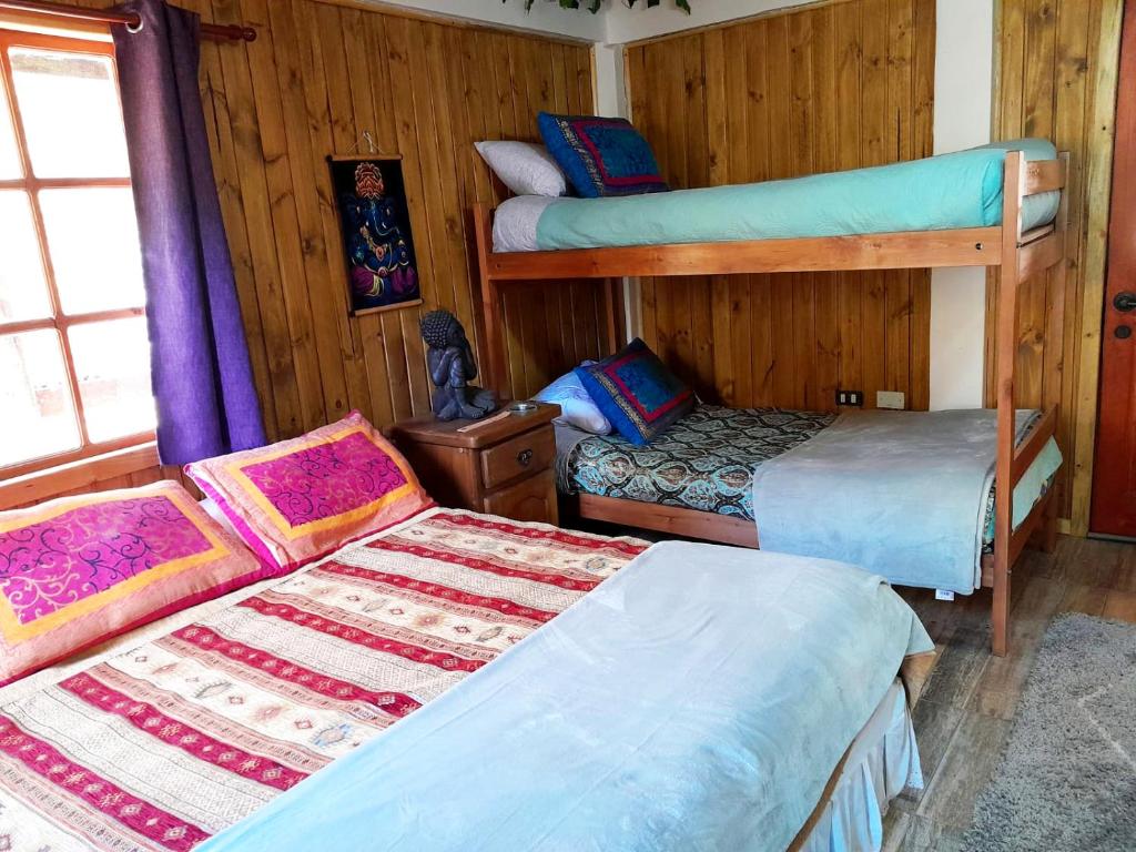 Cama o camas de una habitación en Suite Refugio de Luz