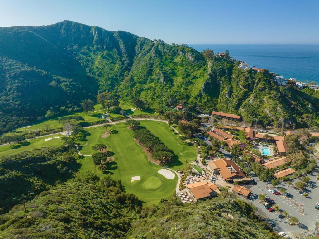 an aerial view of a golf course next to the ocean at The Ranch at Laguna Beach in Laguna Beach