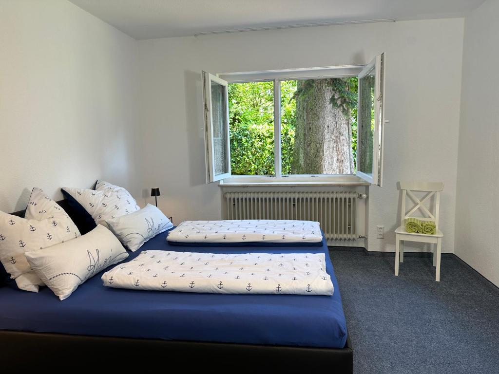 Postel nebo postele na pokoji v ubytování Villa Noho