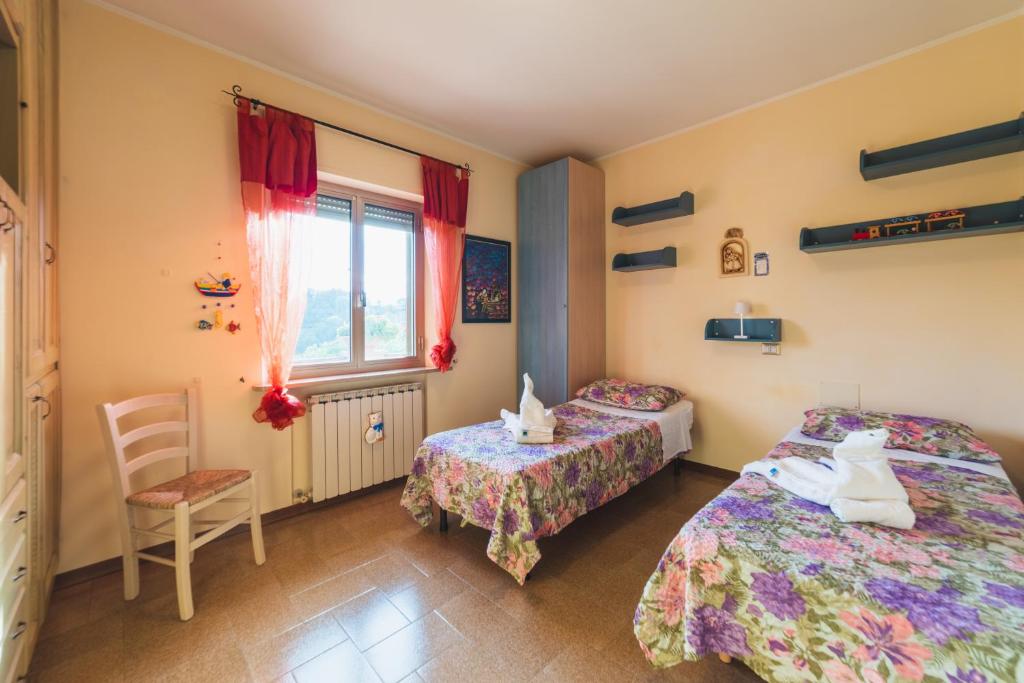 Posteľ alebo postele v izbe v ubytovaní Casa Ambrogi Stefano