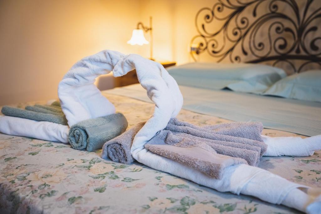 Posteľ alebo postele v izbe v ubytovaní Casa Ambrogi Stefano