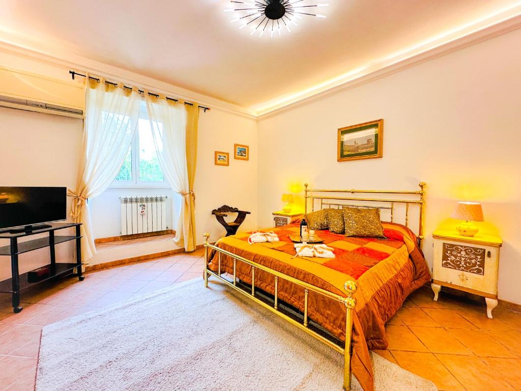 Ліжко або ліжка в номері Giardino degli Aranci Lulus Home