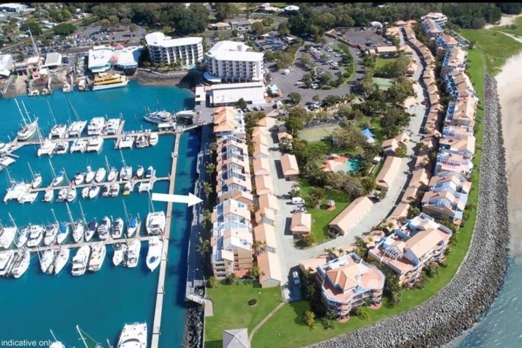 an aerial view of a marina with boats at MarinaView Unit 24 - Break Free Resort- 2 Bedroom Self Contained in Urangan