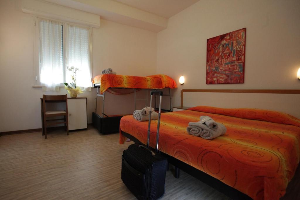 Postel nebo postele na pokoji v ubytování Hotel Ritter