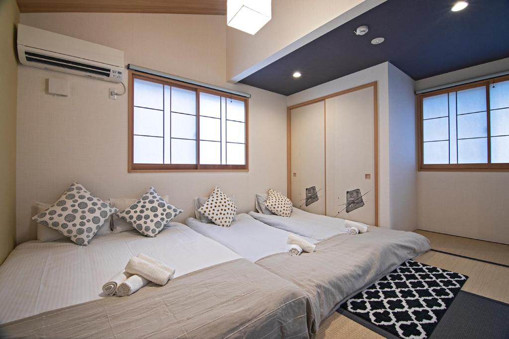-時の宿 二条- 二条城前駅 Toki Nijo RoomBにあるベッド