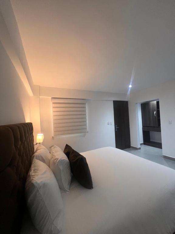 Postel nebo postele na pokoji v ubytování Hotel Zuriel Boutique