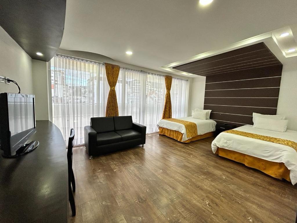Postel nebo postele na pokoji v ubytování Hotel Palermo Suite