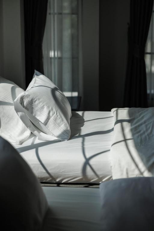 Giường trong phòng chung tại Casa Luna