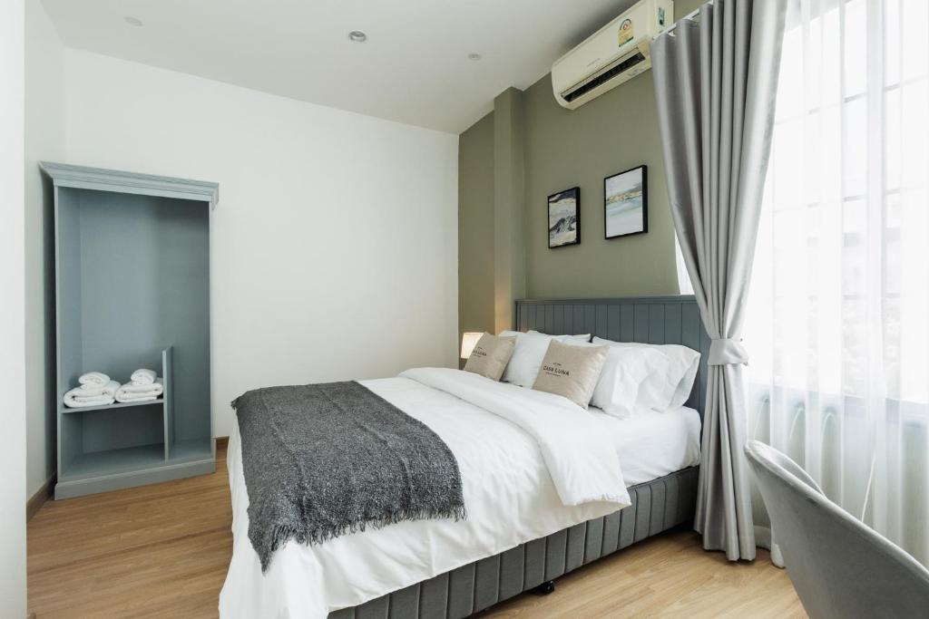 Giường trong phòng chung tại Casa Luna