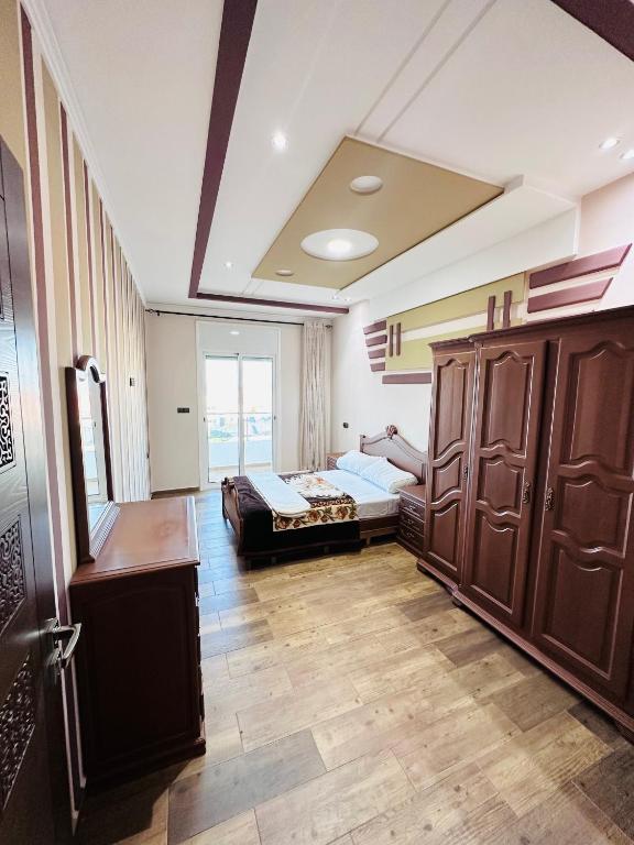 Postel nebo postele na pokoji v ubytování Abraj Dubai Larache