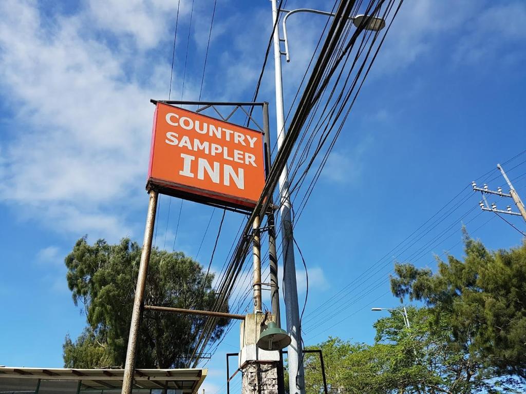 Certifikát, hodnocení, plakát nebo jiný dokument vystavený v ubytování Country Sampler Inn
