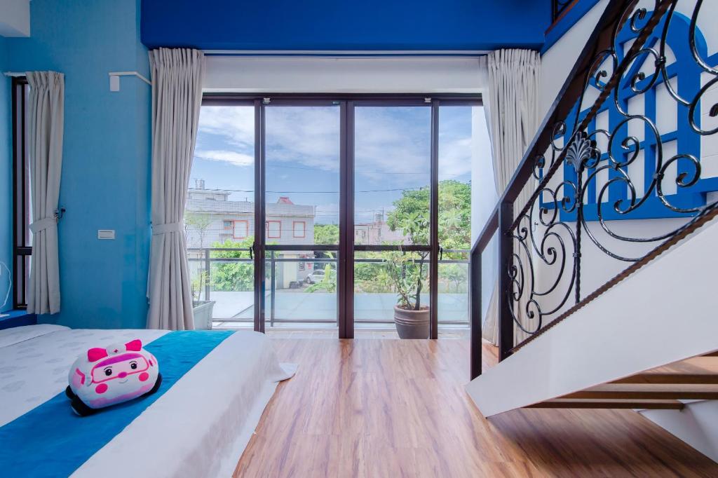 Postel nebo postele na pokoji v ubytování Jiaoxi 320 B&B