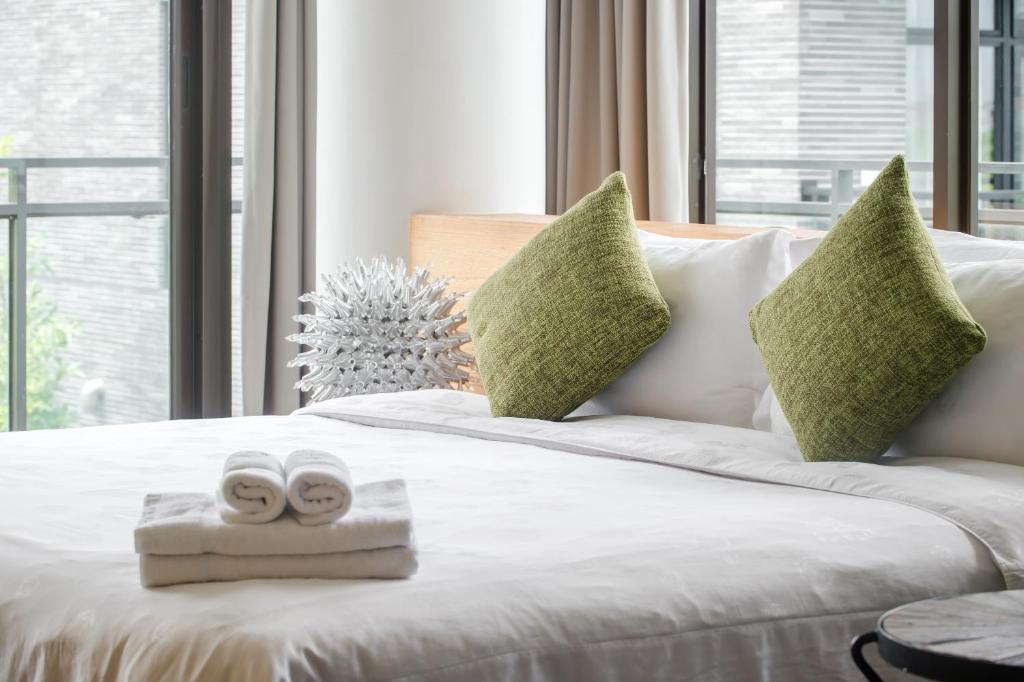 Postel nebo postele na pokoji v ubytování Jiaoxi 320 B&B