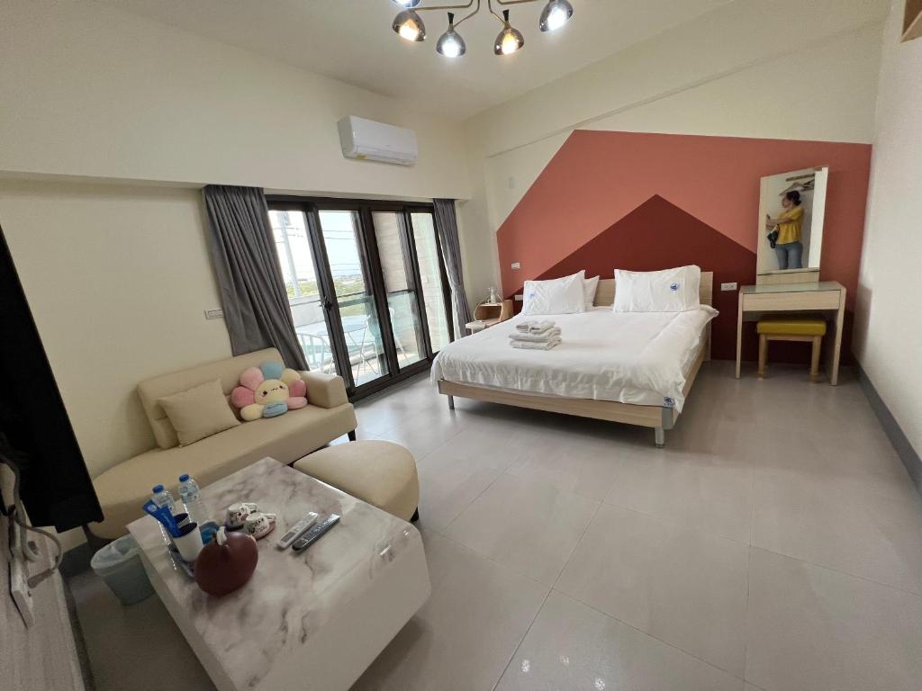 Voodi või voodid majutusasutuse Dongjin Bay B&B toas