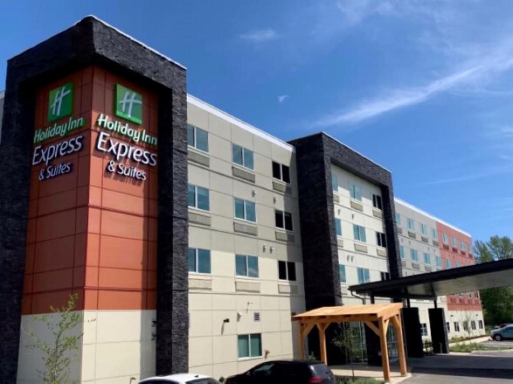 a building with a sign in front of it at Holiday Inn Express & Suites - Courtenay - Comox, an IHG Hotel in Courtenay