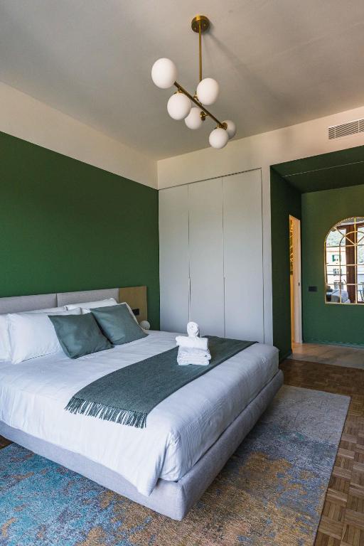 Postel nebo postele na pokoji v ubytování Gaby Lake Suites