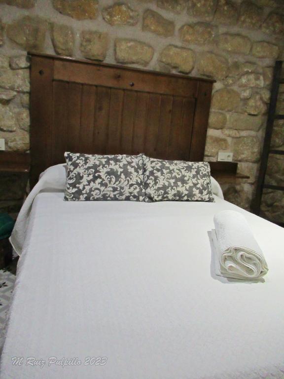 Postel nebo postele na pokoji v ubytování La alegria de las cuevas