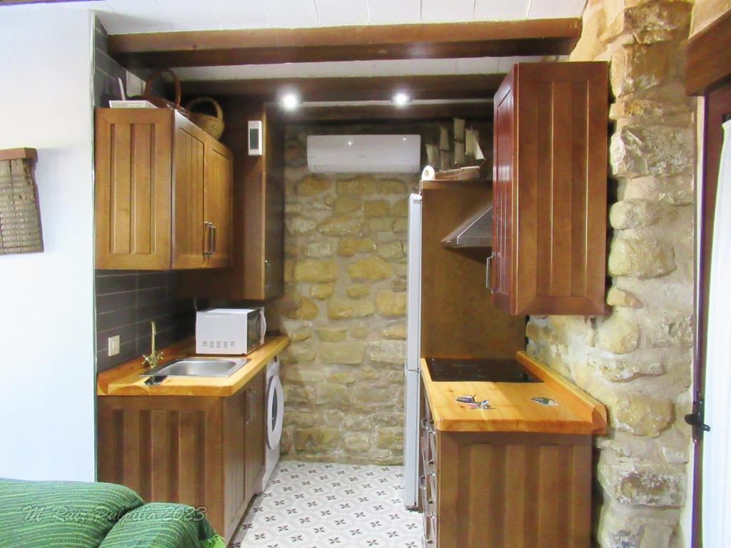 Kuchyň nebo kuchyňský kout v ubytování La alegria de las cuevas