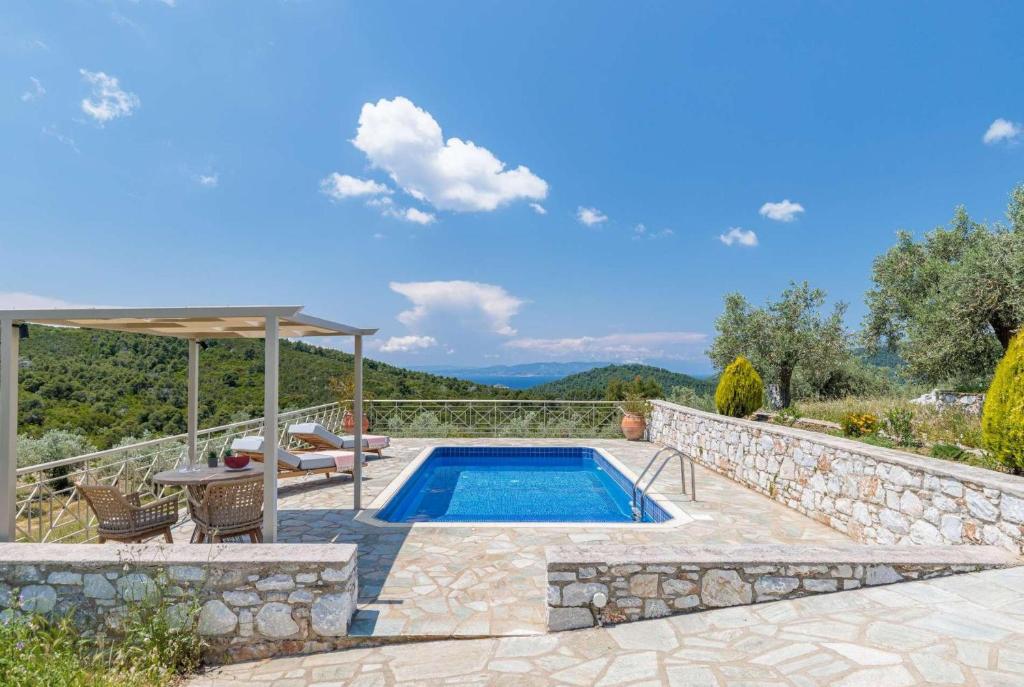 an image of a swimming pool in a villa at Nektaria in Alikias