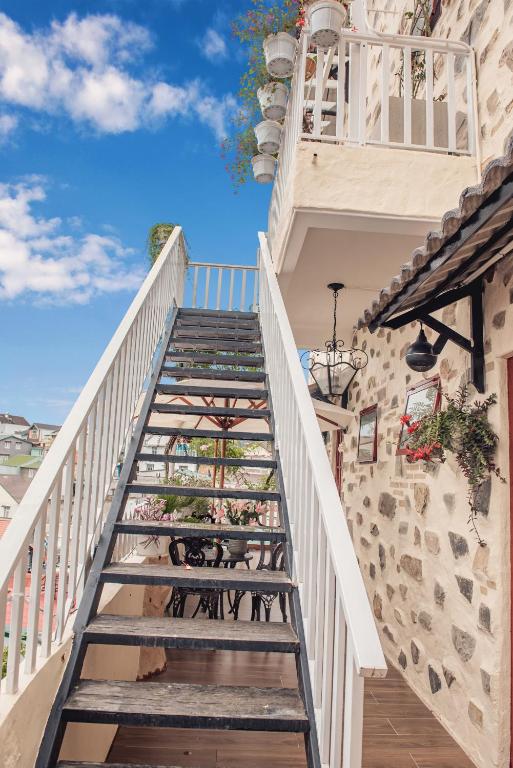 a staircase leading up to a building at Villa Hoa Da in Da Lat