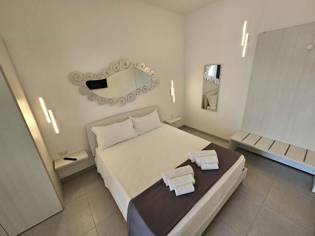 Postel nebo postele na pokoji v ubytování Diletta's Residence