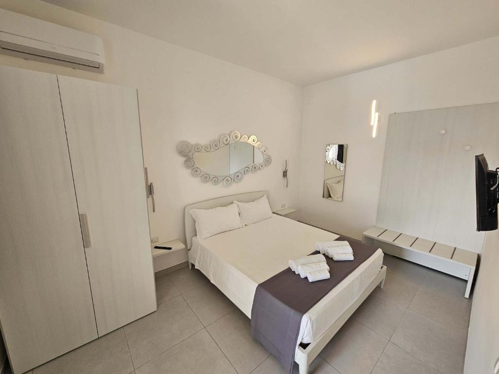 Postel nebo postele na pokoji v ubytování Diletta's Residence