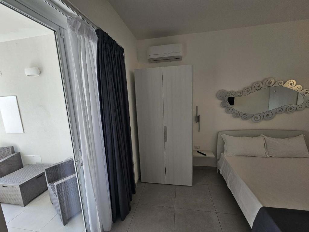 Postel nebo postele na pokoji v ubytování Diletta's Residence