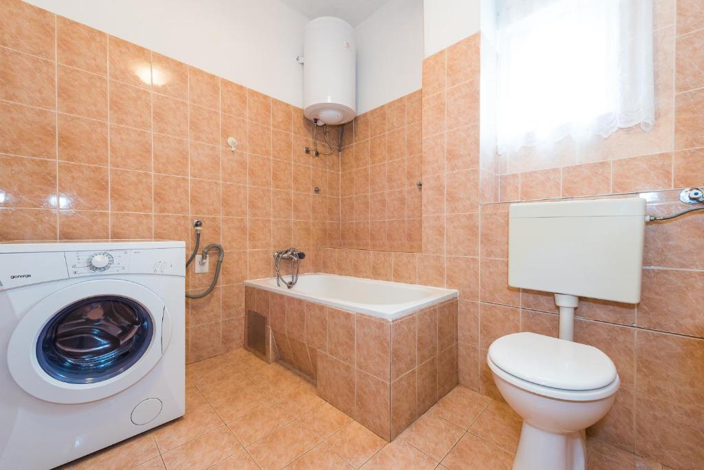 Koupelna v ubytování Apartments Remini