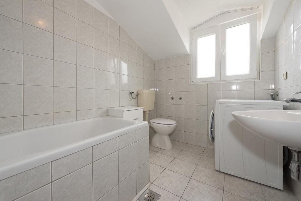 Koupelna v ubytování Apartments Remini