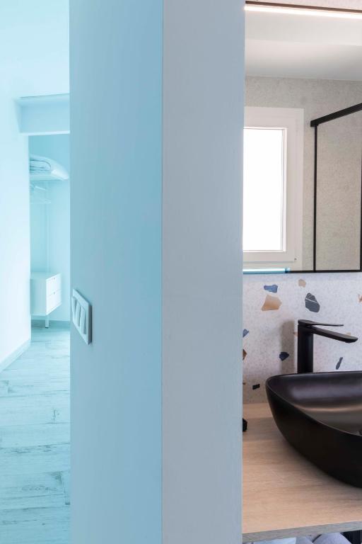 Postel nebo postele na pokoji v ubytování Hostal Boutique La Mar Serena