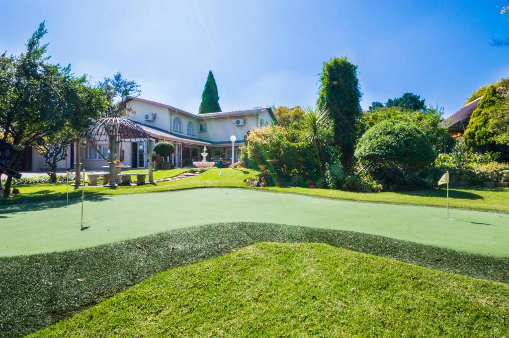 Zahrada ubytování Golfer's Lodge