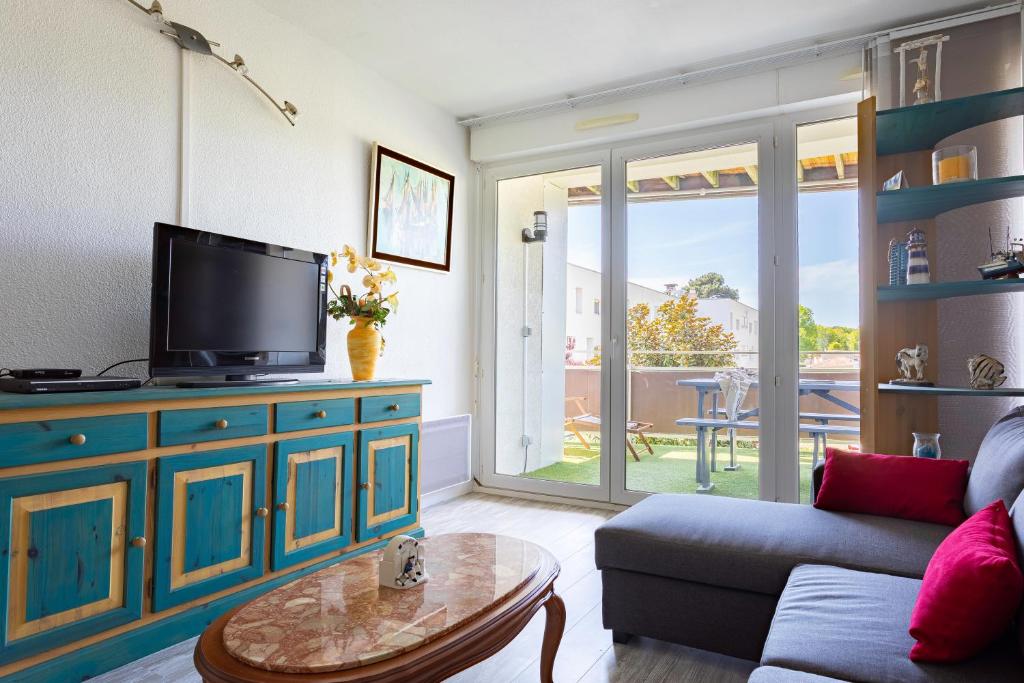 Fotografia z galérie ubytovania Appartement 5 couchages dans résidence avec piscine v destinácii Biscarrosse