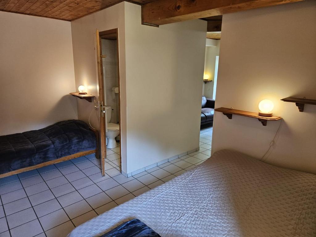 Letto o letti in una camera di Gîte de l'Eau Vive