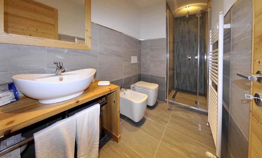 Koupelna v ubytování Albergo Alla Torre