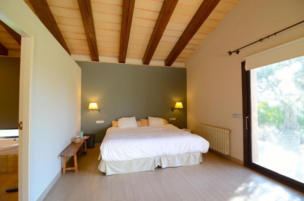 Postel nebo postele na pokoji v ubytování Villa Brugueres Begur