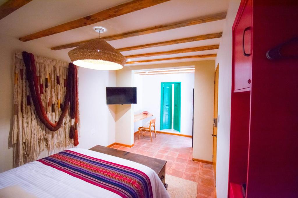 Postel nebo postele na pokoji v ubytování Casa Moseua