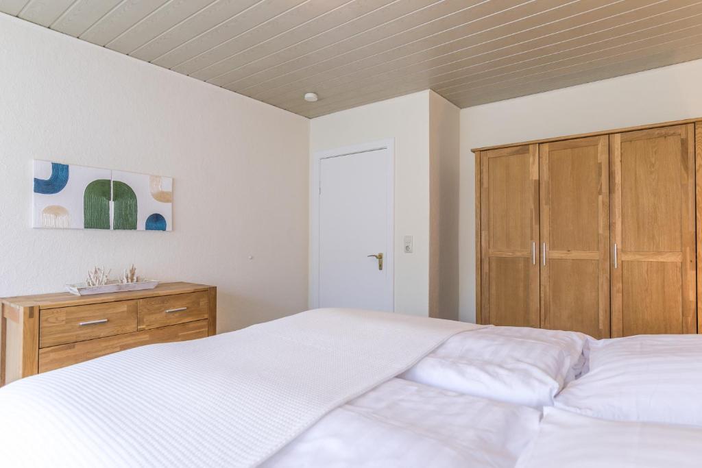 Postel nebo postele na pokoji v ubytování "Nordseetraum" Nordseetraum, Bungalow