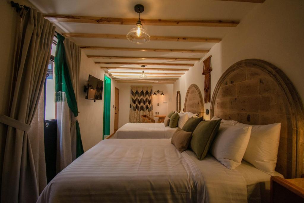 Postel nebo postele na pokoji v ubytování Casa Moseua