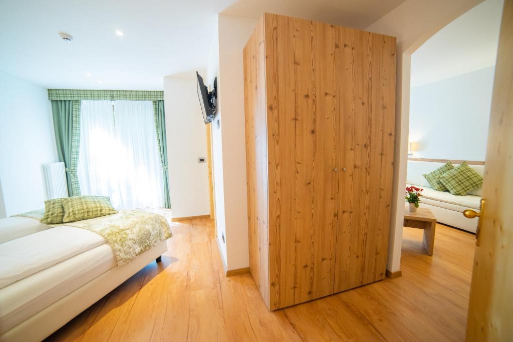 Postel nebo postele na pokoji v ubytování Hotel Almazzago