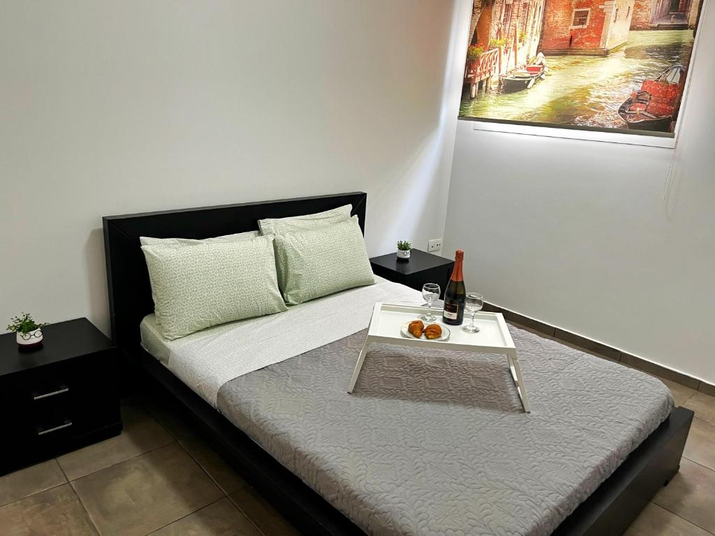 Katil atau katil-katil dalam bilik di Olivia Apartment