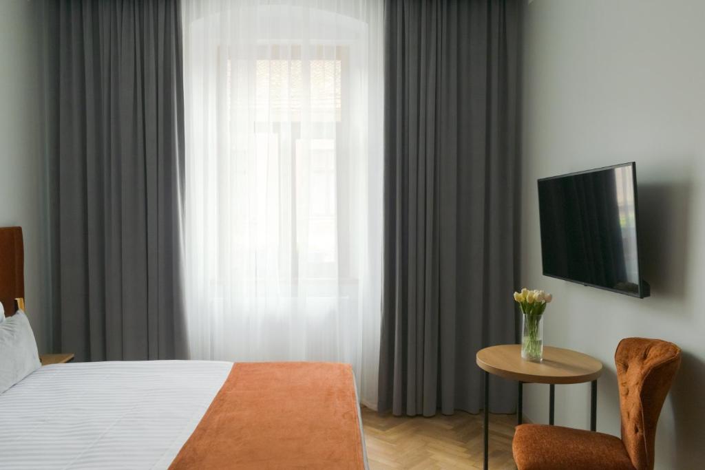Een bed of bedden in een kamer bij Prinz Gregor