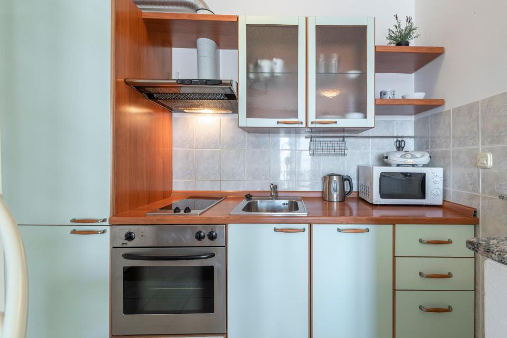 Kuchyňa alebo kuchynka v ubytovaní Apartment Soulmate